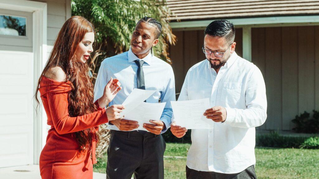 people holding papers